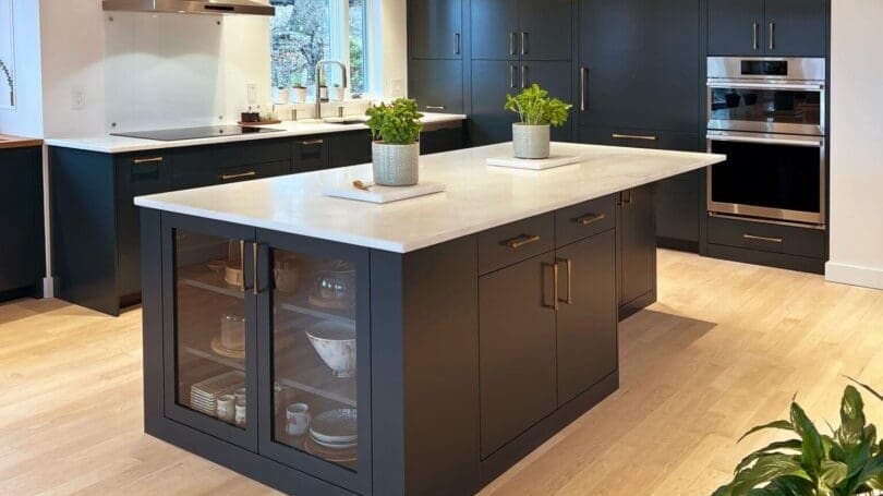 Modern kitchen island with dark cabinets